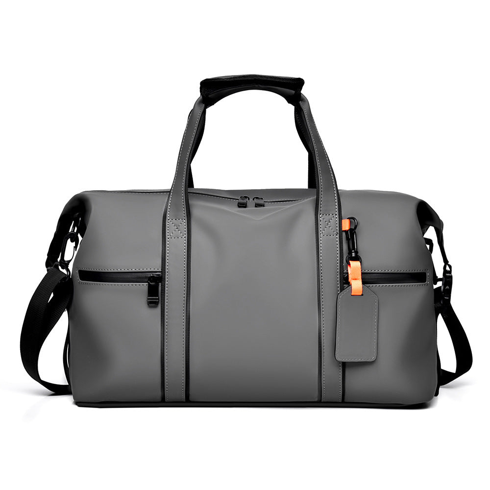 Gray duffel bag with black accents on a white background