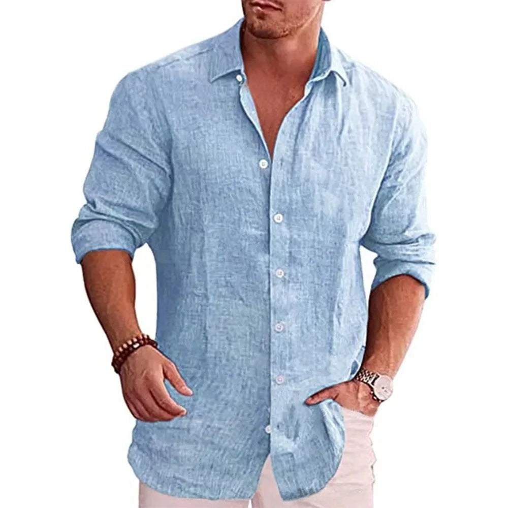 Man wearing a light blue button-up shirt on a white background