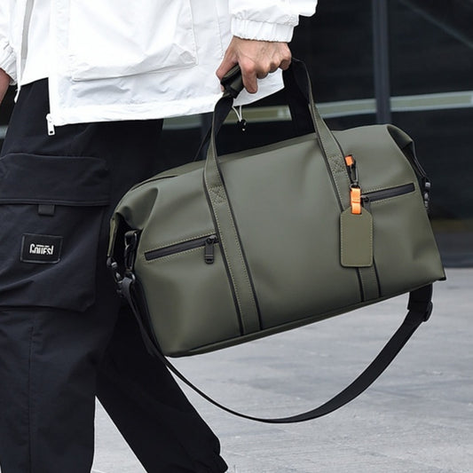Person holding a green duffel bag 